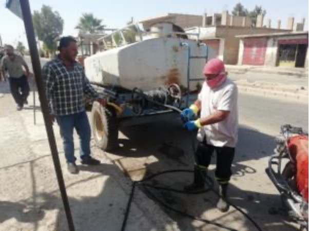 فتح وتعزيل فوهات مطرية في الحي الشرقي بناحية بتل براك